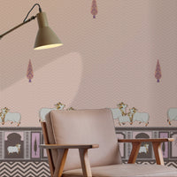 Light pink Pichwai wallpaper with cow motifs, traditional border detailing, and subtle chevron pattern for elegant Indian interiors.