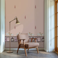 Light pink Pichwai wallpaper with cow motifs, traditional border detailing, and subtle chevron pattern for elegant Indian interiors.