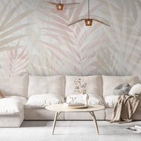 An architectural perspective of a contemporary sunlit lounge featuring the Hush Leaves Mural in Pale Beige as a full-scale feature wall. The mural’s soft neutral tones pair elegantly with linen upholstery, natural wood furniture, and warm terracotta accents, creating a serene and sophisticated interior sanctuary.