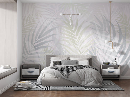 An architectural perspective of a contemporary sunlit lounge featuring the Hush Leaves Mural in Pale Green as a full-scale feature wall. The mural’s soft verdant tones pair elegantly with light birch furniture, white linen upholstery, and natural woven accents, creating a serene and sophisticated interior sanctuary.
