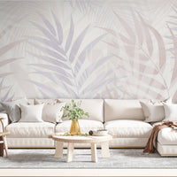 An architectural perspective of a contemporary sunlit lounge featuring the Hush Leaves Mural in Pale Lilac as a full-scale feature wall. The mural’s soft purple tones pair elegantly with beige velvet upholstery, light oak furniture, and natural woven accents, creating a serene and sophisticated interior sanctuary.