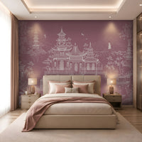 A modern bedroom featuring a large purple accent wall with a white architectural mural of pagodas and birds, styled with a beige platform bed, matching pillows, bedside tables, and warm ambient lighting.