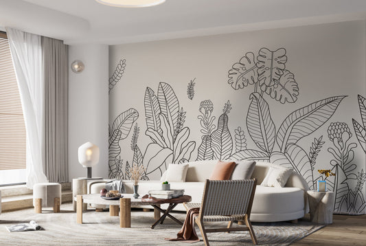 An architectural perspective of a modern living room featuring the Linear Tropical Forest Mural as a full-scale feature wall. The mural’s dark gray and white tones pair strikingly with a cognac leather armchair, light wood flooring, and minimalist furniture, creating a sophisticated and high-impact interior atmosphere.