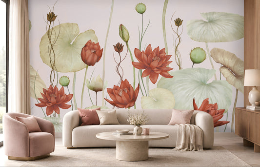 A large-scale floral wall mural featuring red lotus flowers and green lily pads on a pale background, displayed behind a cream sofa and pink armchair in a modern living room setting.