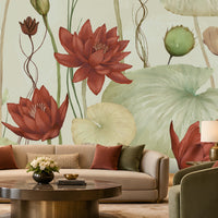 Luxurious contemporary living room featuring a large botanical lotus mural with terracotta-red flowers, soft green and beige lotus leaves, complemented by neutral seating, olive-green armchairs, warm wood accents, and elegant ambient lighting.