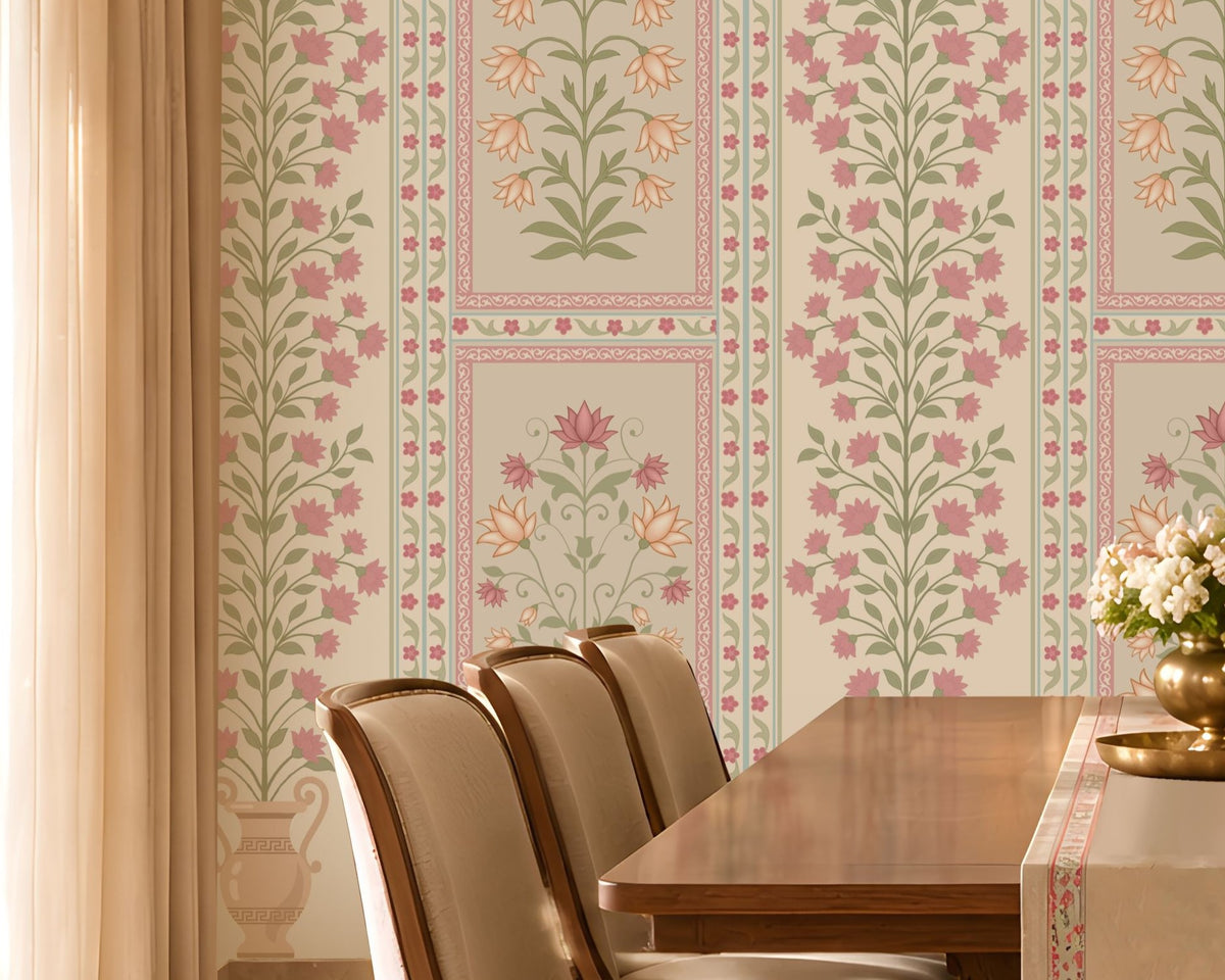 Elegant pastel floral wallpaper featuring delicate purple and peach flowers with soft sage-green vines on a light cream background, showcased in a luxurious Indian-style bedroom with ornate ivory furniture, blush pink accents, traditional arched windows, and warm chandelier lighting.