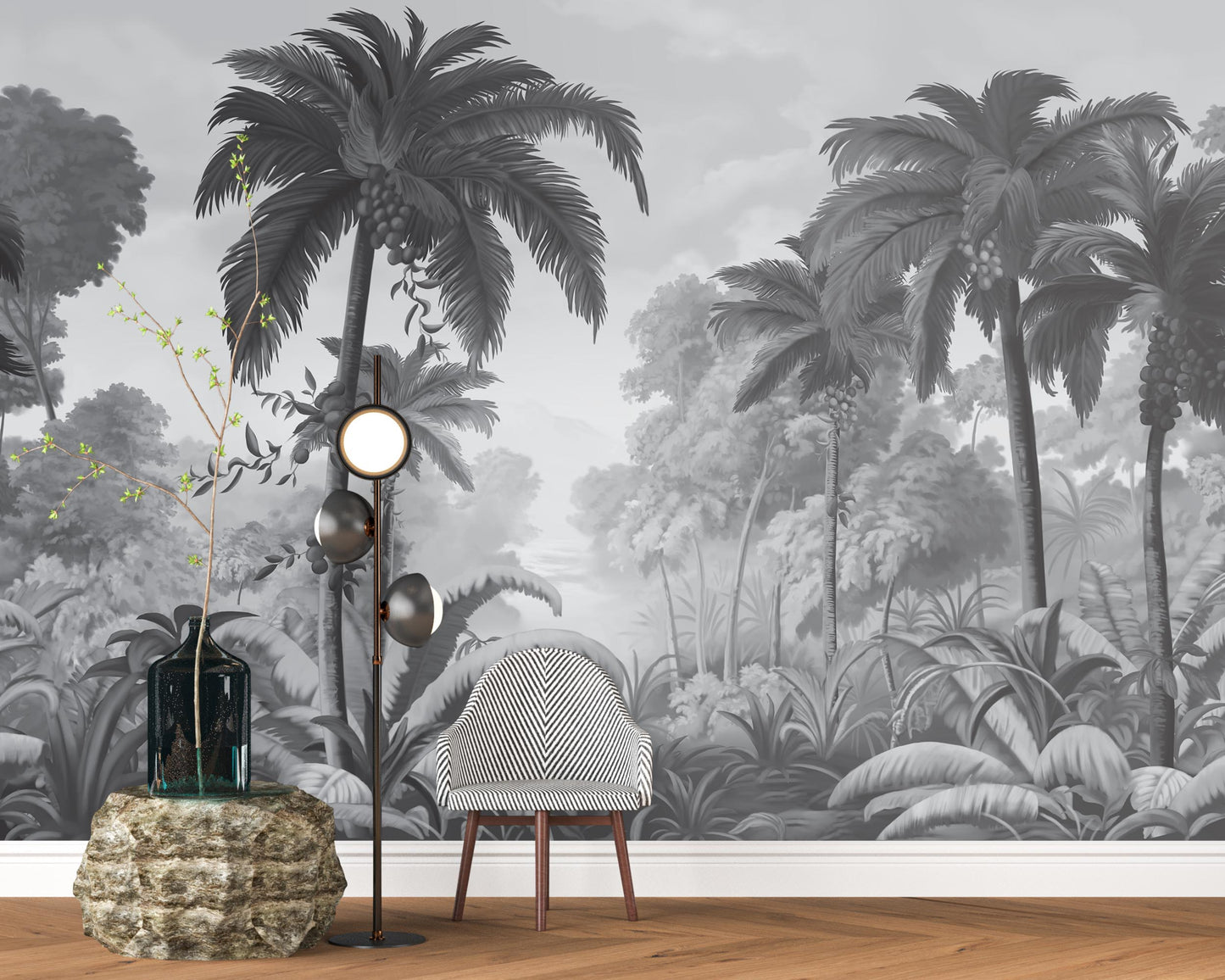 An architectural perspective of a contemporary lounge featuring the Luxe Tropical Greens Mural in Grey as a full-scale feature wall. The mural’s expansive jungle vista pairs elegantly with sleek stone surfaces and polished metal accents, creating a peaceful and cultured interior sanctuary.