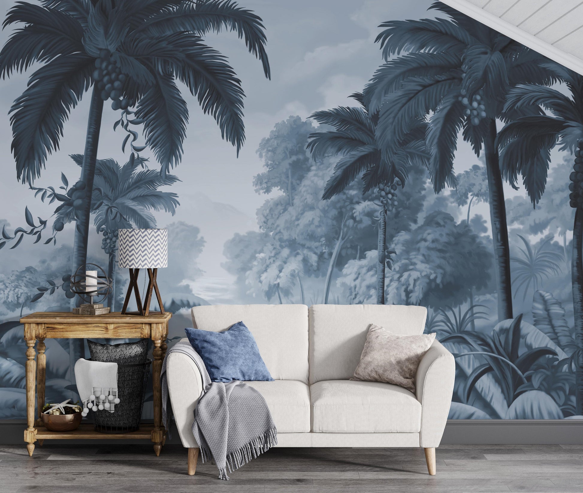 An architectural perspective of a contemporary lounge featuring the Luxe Tropical Greens Mural in Midnight Blue as a full-scale feature wall. The mural’s expansive jungle vista pairs elegantly with crisp white furniture and metallic accents, creating a peaceful and cultured interior sanctuary.
