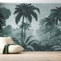 An architectural perspective of a contemporary lounge featuring the Luxe Tropical Greens Mural in Misty Morning as a full-scale feature wall. The mural’s expansive jungle vista pairs elegantly with light-toned furniture and minimalist decor, creating a peaceful and cultured interior sanctuary.