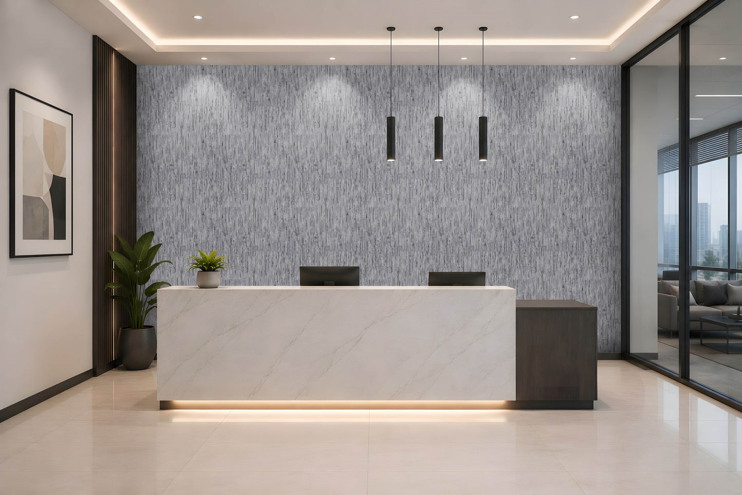 A modern reception desk in a sleek office lobby, featuring a white marble front with a dark wood side panel and a textured gray accent wall behind it.