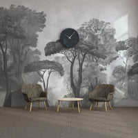 An architectural perspective of a contemporary lounge featuring the Mediterranean Reverie Forest Mural in Ash Grey as a full-scale feature wall. The mural’s expansive forest vista pairs strikingly with sleek stone surfaces and polished metal accents, creating a peaceful and cultured interior sanctuary.
