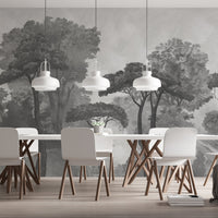 An architectural perspective of a contemporary lounge featuring the Mediterranean Reverie Forest Mural in Ash Grey as a full-scale feature wall. The mural’s expansive forest vista pairs strikingly with sleek stone surfaces and polished metal accents, creating a peaceful and cultured interior sanctuary.