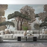 An architectural perspective of a contemporary lounge featuring the Mediterranean Reverie Forest Mural in Stormy Bay as a full-scale feature wall. The mural’s expansive forest vista pairs strikingly with crisp white furniture and metallic accents, creating a peaceful and cultured interior sanctuary.