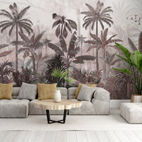 An architectural perspective of a high-end contemporary lounge featuring the Mystic Rainforest Haven Mural in Cold Turkey as a full-scale feature wall. The mural’s expansive botanical vista pairs elegantly with charcoal accents and stone-textured flooring, creating a peaceful and cultured interior sanctuary.