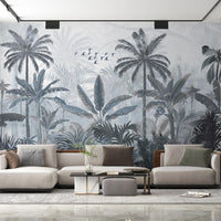 An architectural perspective of a high-end lounge area featuring the Mystic Rainforest Haven Mural in Night Rendezvous as a full-scale feature wall. The mural’s expansive botanical vista pairs elegantly with modern furniture and warm accent lighting, creating a peaceful and cultured interior sanctuary.