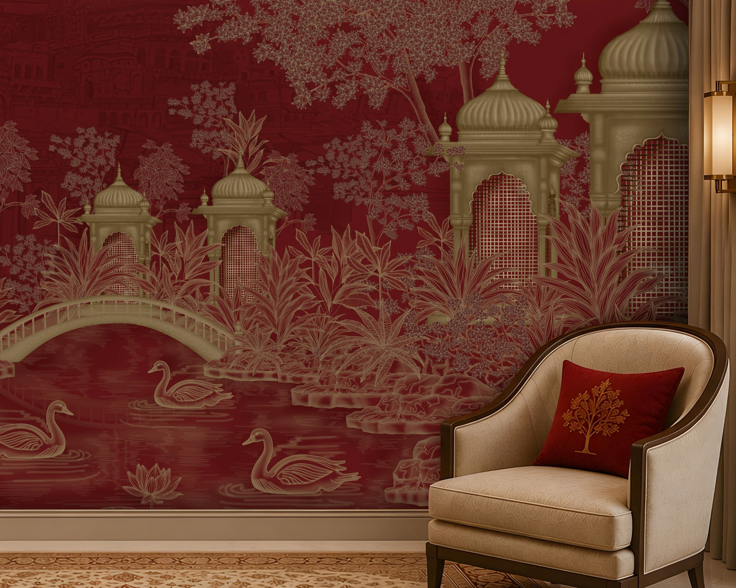 A styled interior scene featuring a deep red wallpaper with a chinoiserie-style garden pattern of pavements, a bridge, lotus flowers, and swans, paired with a cream upholstered armchair and a red decorative pillow.
