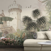 A high-resolution detail of the Palms of the Old Fort Tropical Wallpaper, showcasing the intricate illustrative linework of the stone battlements and the delicate feathers of the cranes nestled among pink blossoms. The image highlights the soft, painterly textures and the refined tonal shifts between soft ivory, muted olive, and dusty rose.