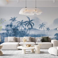 An architectural perspective of a modern, low-profile lounge featuring the Panoramic Tranquility Mural in Shipyard as a full-scale feature wall. The mural’s wide-angle coastal vista pairs strikingly with sleek metal accents and polished stone surfaces, creating a peaceful and cultured interior sanctuary.