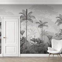 An architectural perspective of a high-ceilinged contemporary lounge featuring the Paradise Palms Mural in Ivory White as a full-scale feature wall. The mural’s expansive botanical vista pairs elegantly with light-toned furniture and organic textures, creating a peaceful and cultured interior sanctuary.