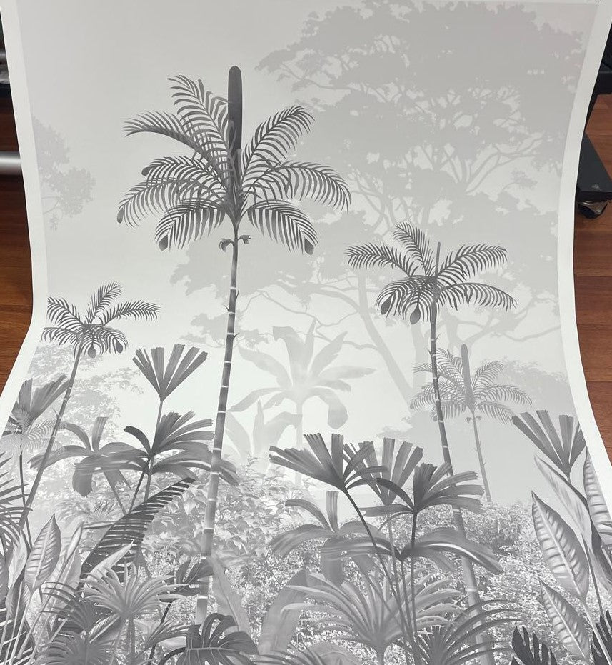 An architectural perspective of a high-ceilinged contemporary lounge featuring the Paradise Palms Mural in Ivory White as a full-scale feature wall. The mural’s expansive botanical vista pairs elegantly with light-toned furniture and organic textures, creating a peaceful and cultured interior sanctuary.