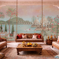 Peach and blush pink Pichwai wallpaper mural installed in a grand Indian classical music room with lotus lake, cows, and Vrindavan heritage design in soft pastel tones with natural daylight.