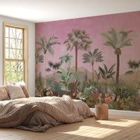 Bohemian bedroom interior featuring a wide-angle view of a pink tropical palm mural on a large accent wall with neutral bedding and natural light.