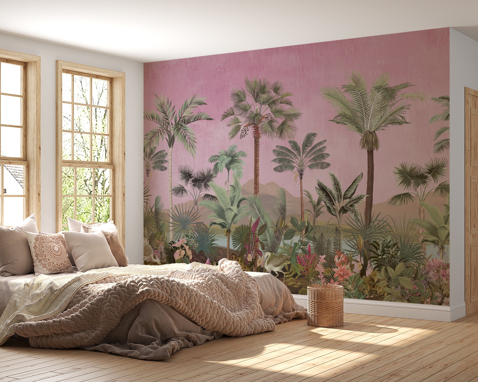 Bohemian bedroom interior featuring a wide-angle view of a pink tropical palm mural on a large accent wall with neutral bedding and natural light.