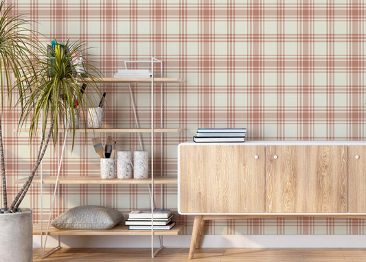 Peach plaid wallpaper featuring a soft checkered pattern in warm peach and beige tones, styled in a modern Scandinavian-inspired room with wooden furniture, indoor plants, and minimal decor, creating a cozy and elegant interior backdrop.