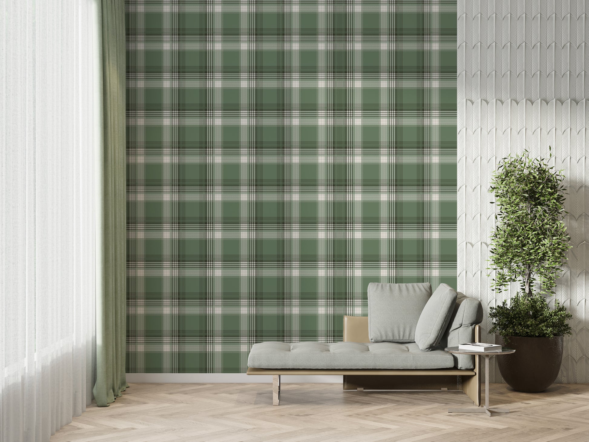 A modern living space featuring a prominent olive green and white plaid wallpaper accent wall. In front of the wall sits a sleek grey chaise lounge with matching plush pillows, accompanied by a small, round metal side table. To the left, a large window is dressed with sheer white curtains and long, sage green drapes over herringbone wood flooring. To the right, a textured white feature wall provides contrast, with a large potted green plant in a dark ceramic planter standing in the corner.