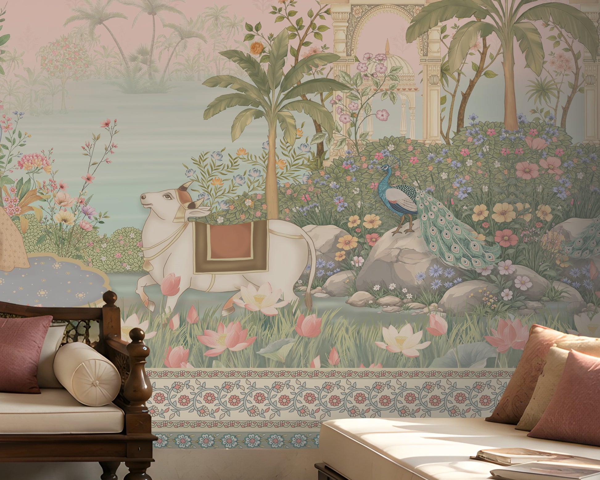 Radha Madhav pink heritage wall mural in a luxury Indian living room with carved wooden seating, floral cushions, brass décor, and traditional rug.