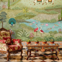 This Vrindavan Green pichwai mural features a lush, sacred landscape wallpaper design showcasing holy cows, vibrant peacocks, and cranes. The traditional Indian folk-art style depicts rolling green hills, lotus ponds, and blooming botanical details. Ideal as a cultural accent wall, this nature-inspired decor adds spiritual elegance to heritage interiors, pairing perfectly with ornate wooden furniture and traditional architectural motifs for a grand, storied atmosphere.