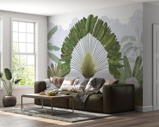 An architectural perspective of a modern living room featuring the Regal Fronds Mural as a full-scale feature wall behind a deep forest green leather sofa. The mural’s symmetrical botanical design pairs elegantly with large windows and natural wood flooring, creating a sophisticated and immersive interior sanctuary.