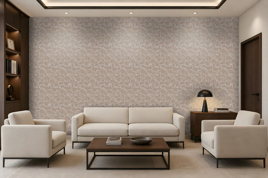 A modern living room featuring a large wall covered in beige and white abstract patterned wallpaper, styled with a cream sofa, two matching armchairs, a dark wood coffee table, and a black table lamp.