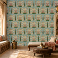 Shriji Darbar Heritage Wallpaper in soft sky blue featuring traditional Indian palace arches, royal court scenes, ornamental motifs, and elegant cypress trees in a seamless repeating pattern, showcased in a sophisticated living room with carved wooden furniture, brass accents, and warm natural light.