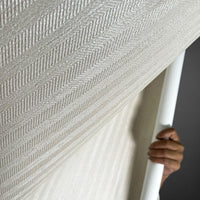 Close-up view of Waterproof Fabric Backed Commercial Wallcovering in Dove Grey, featuring a refined herringbone pattern and a durable, moisture-resistant vinyl surface for professional interiors.