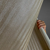 Close-up view of Waterproof Fabric Backed Commercial Wallcovering in Ash Brown, featuring a detailed herringbone weave and a durable, moisture-resistant vinyl surface for professional interiors.