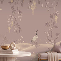 Timeless Avian Garden Mural in Dusty Mauve Taupe featuring delicate botanical branches, graceful birds, soft ivory flowers, flowing foliage, and subtle golden floral accents. The elegant nature-inspired mural creates a serene and sophisticated interior with warm neutral décor, soft lighting, arched windows, and refined contemporary furnishings.