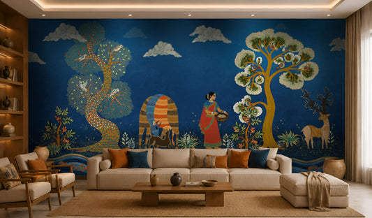 Traditional Gond Art wallpaper in royal blue featuring hand-painted Indian folk art with trees, birds, wildlife, and village life, displayed as a luxury living room feature wall.
