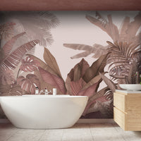 An architectural perspective of a contemporary living room featuring the Tropical Forest Mural in New York Pink as a full-scale feature wall. The mural’s warm botanical composition pairs elegantly with velvet furniture and brass accents, creating a chic and sophisticated interior sanctuary.