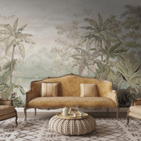 An architectural perspective of a contemporary lounge featuring the Tropical Island Oasis Mural in Artichoke Green as a full-scale feature wall. The mural’s balanced, panoramic composition pairs elegantly with natural rattan furniture and linen textiles, creating a peaceful and cultured interior sanctuary.