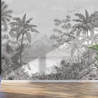 An architectural perspective of a contemporary lounge featuring the Tropical Island Oasis Mural in Pearl Gray as a full-scale feature wall. The mural’s balanced, panoramic composition pairs elegantly with charcoal furniture and metallic accents, creating a peaceful and cultured interior sanctuary.