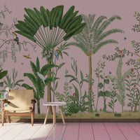 An architectural perspective of a sophisticated master suite featuring the Tropical Jungle Haven Mural in Mauve Pink as a full-scale feature wall. The mural’s detailed wildlife narrative pairs elegantly with velvet textiles and brass accents, creating a grand and cultured interior sanctuary.