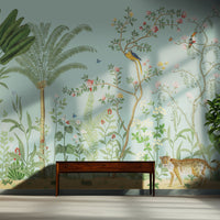 An architectural perspective of a sophisticated hallway featuring the Tropical Jungle Haven Mural as a full-scale feature wall. The mural’s detailed wildlife narrative pairs elegantly with dark wood furniture and natural sunlight, creating a grand and cultured interior sanctuary.