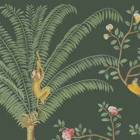 An architectural perspective of a grand dining room featuring the Tropical Jungle Haven Mural in Woodland Green as a full-scale feature wall. The mural’s detailed wildlife narrative pairs elegantly with dark mahogany furniture and brass accents, creating a regal and cultured interior sanctuary.