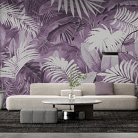 Gentle purple colour tropical leaves mural wallpaper installed as a feature wall in a living room, dining room, and bedroom, showcasing soft purple tones and lush botanical mural wallpaper design.