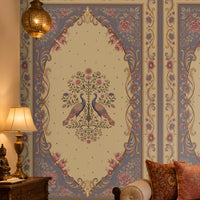 Vanamala Garden Mural Wallpaper - Dusky Lilac displayed in a traditional Indian living room, featuring elegant peacock motifs, intricate floral artwork, ornate heritage frames, and decorative borders in dusky teal blue and soft ivory tones, creating a luxurious palace-inspired interior ambiance.