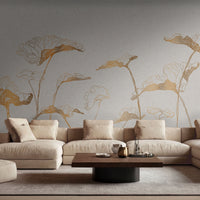 Parchment gold leaf pattern mural wallpaper installed as a feature wall in living room, dining room, and bedroom interiors with botanical detailing.
