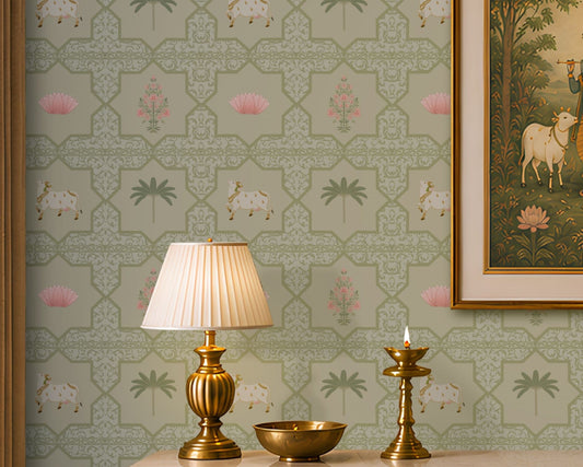 Close-up view of the Vraj Kamal wallpaper showcasing the intricate geometric damask lattice pattern, detailed white Pichwai cows, and delicate pink lotus flower motifs on a soft mint green background.