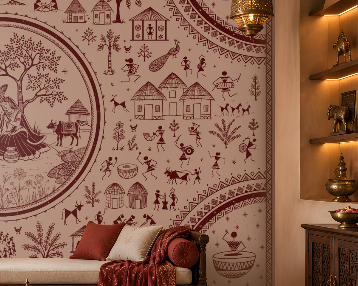 Warli Divine Harmony - Dusty Rose Pink Elegant Warli art seamless wallpaper in soft blush beige and terracotta red, featuring intricate tribal illustrations of village life, dancers, trees, huts, animals, and a central Radha Krishna-inspired motif, styled in a luxurious Indian living room with carved wooden furniture and warm ambient lighting.
