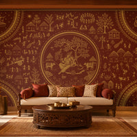 Warli Divine Harmony - Royal Maroon Traditional Warli art seamless wallpaper in burnt terracotta brown featuring intricate ivory tribal motifs, village scenes, huts, trees, peacocks, dancers, and a central Radha Krishna-inspired illustration, styled in an elegant Indian heritage living room with carved wooden furniture and warm earthy décor. 
